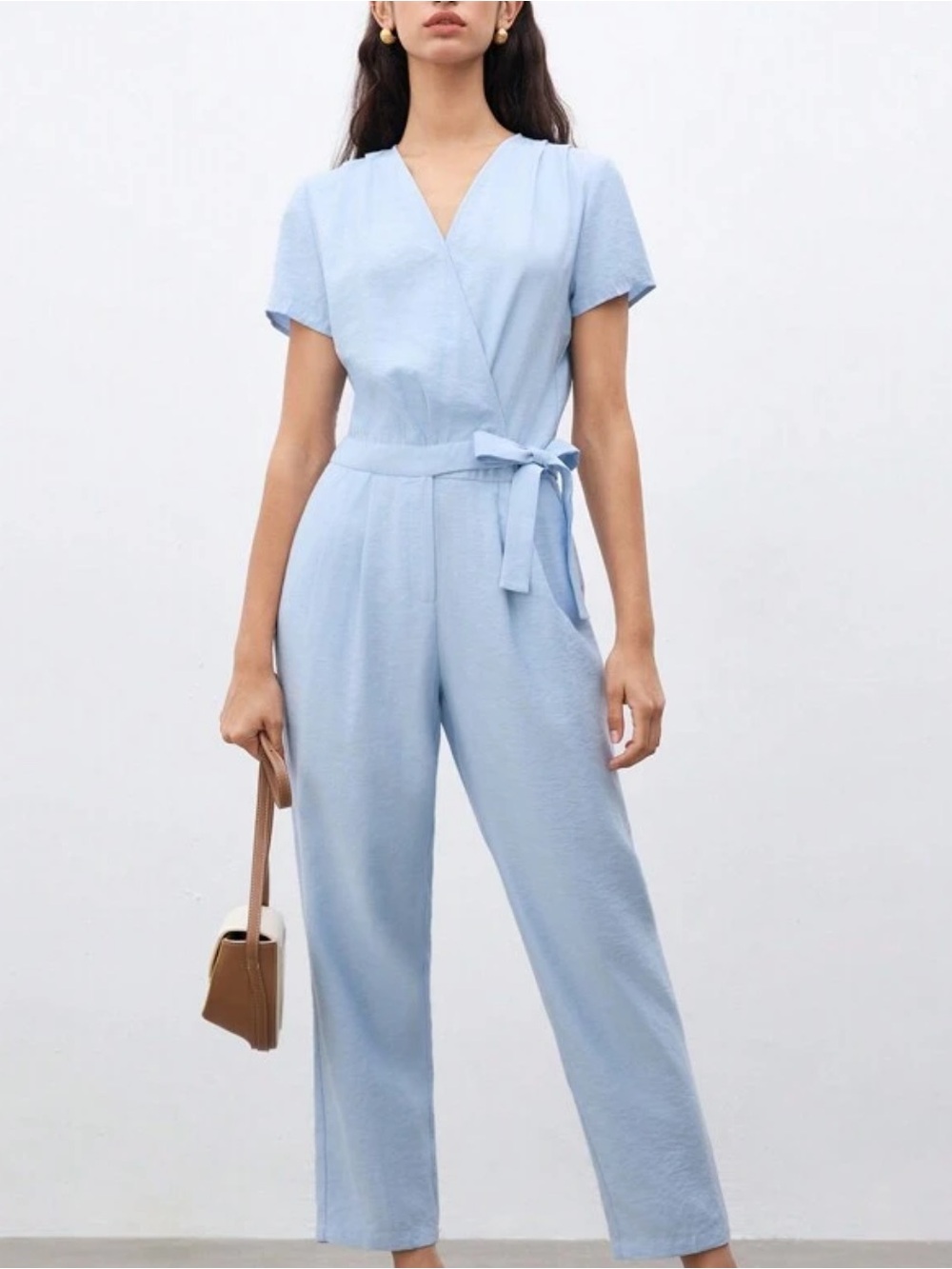Woman’s summer blue shirt sleeve v neck jumpsuit